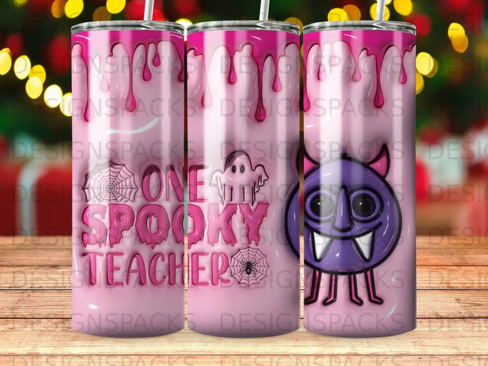 Pink tumbler with "One Spooky Teacher" text and a purple monster graphic.
