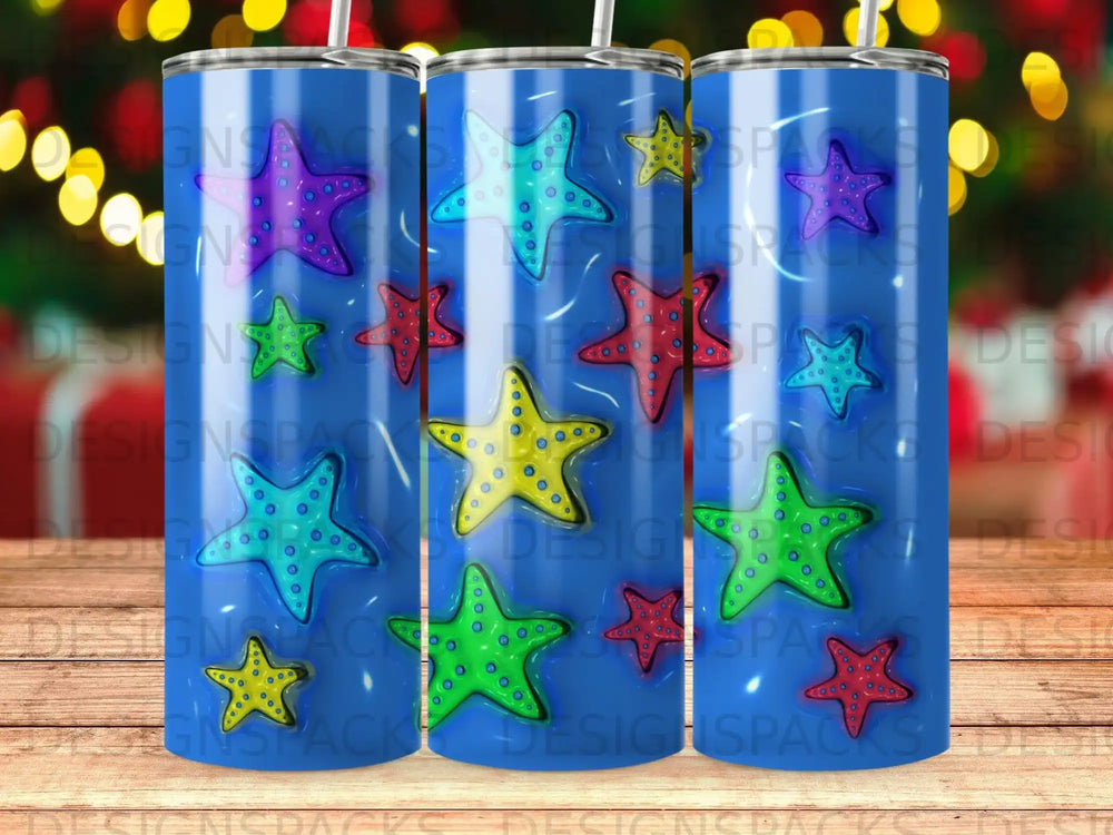 Blue tumbler with colorful starfish and bubbles pattern.