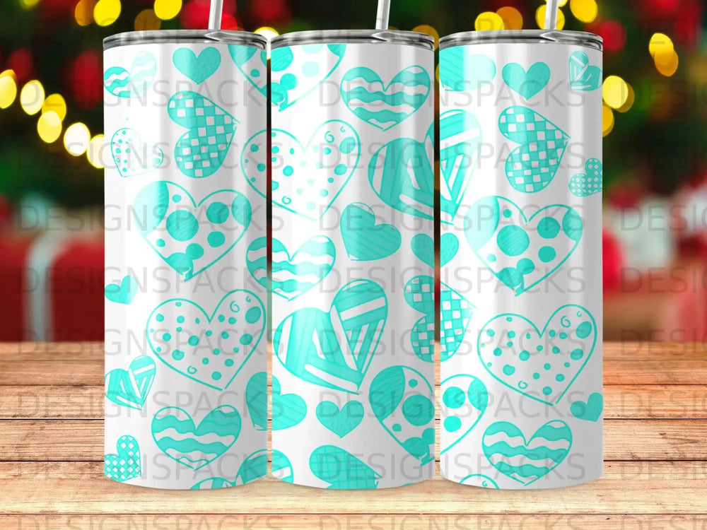 Turquoise hearts pattern on a white tumbler.