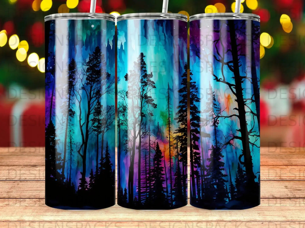 Tumbler with aurora borealis over silhouette of pine trees.