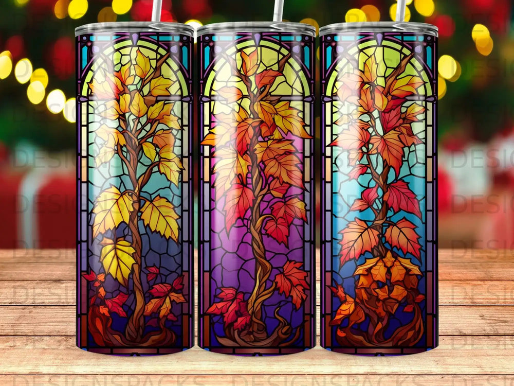 Stained glass pattern of colorful autumn trees with dark outlines.