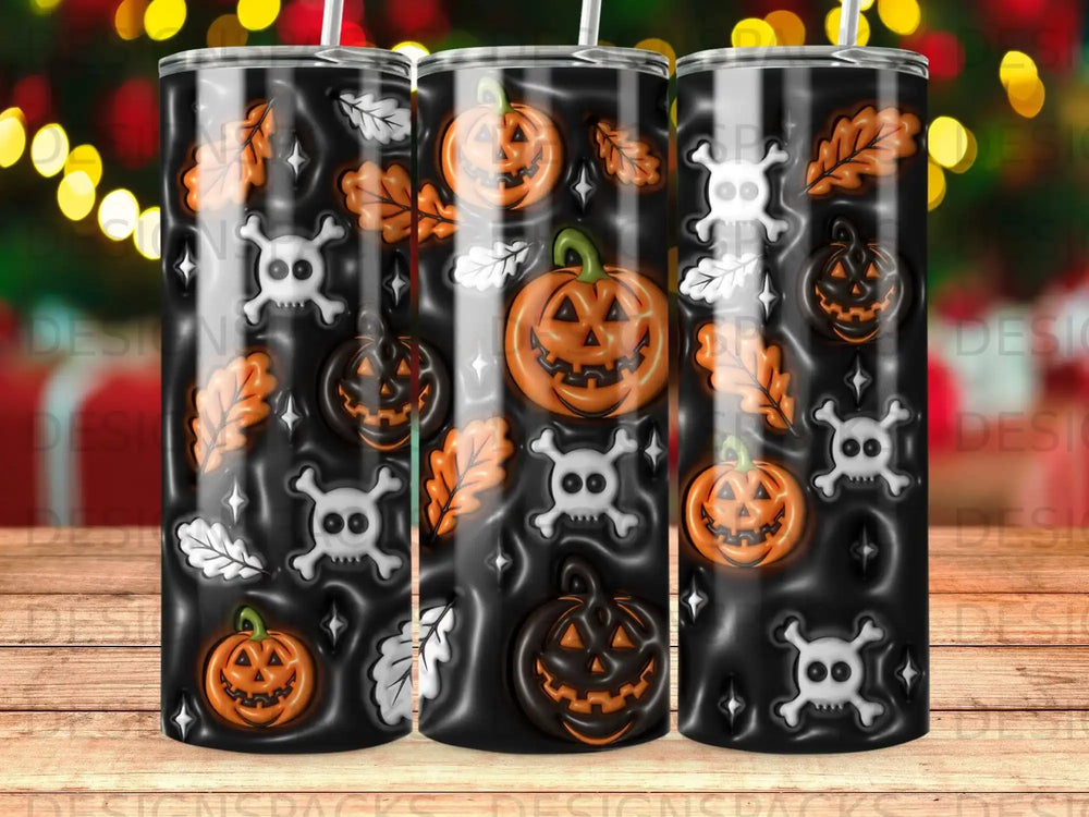 Halloween tumblers with jack-o'-lanterns, skulls, and autumn leaves pattern.