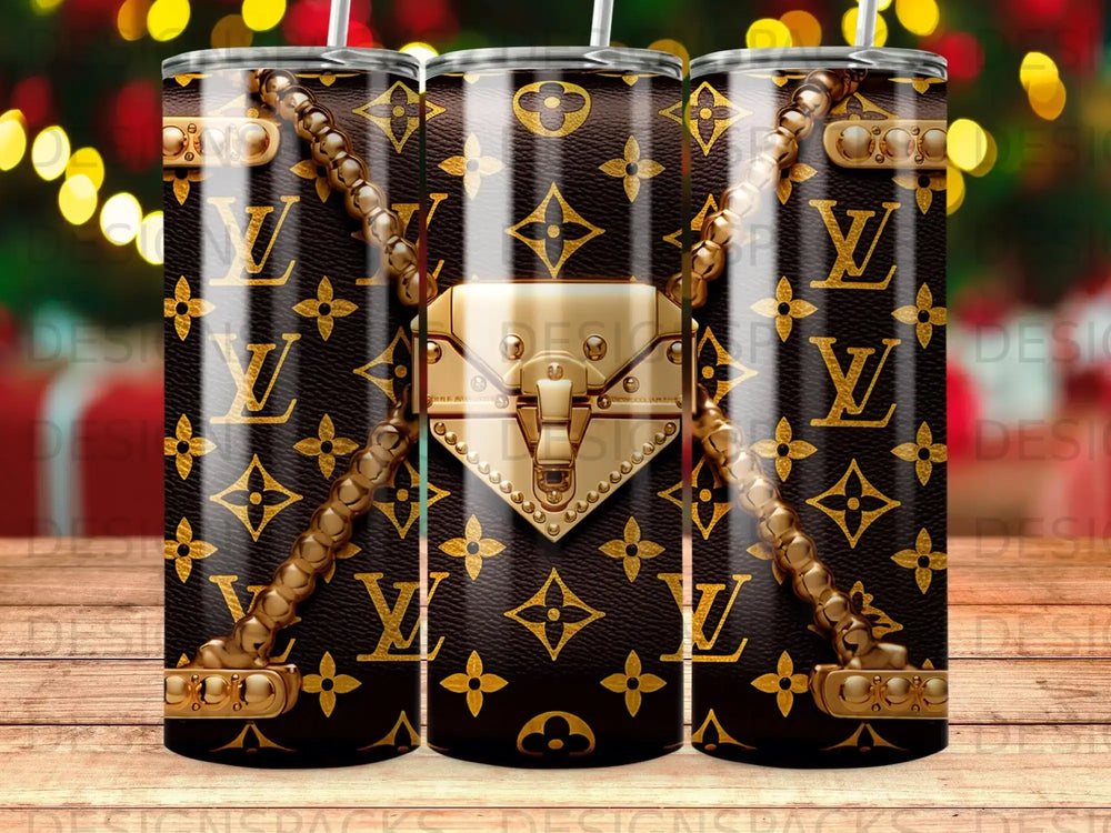 Brown tumbler with Louis Vuitton pattern and gold hardware accents.