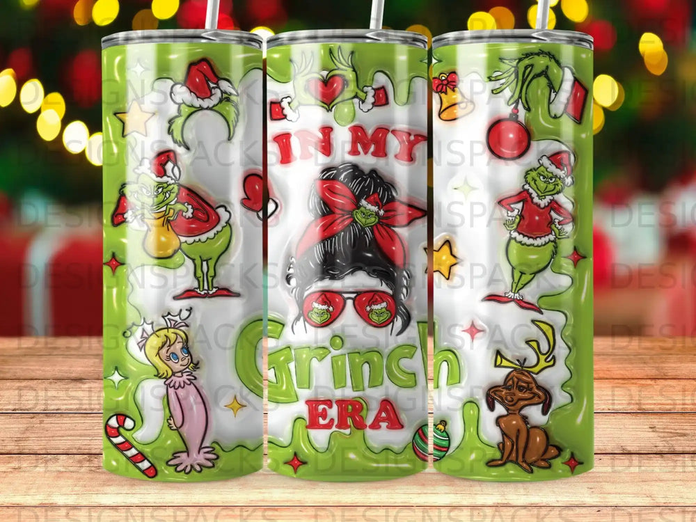 Green Grinch tumbler with "In My Grinch Era" text and holiday graphics.