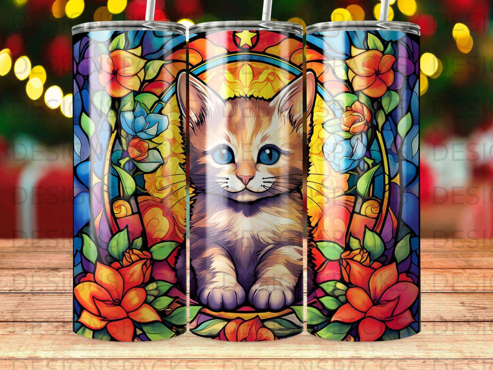 Kitten with blue eyes surrounded by stained-glass floral design.