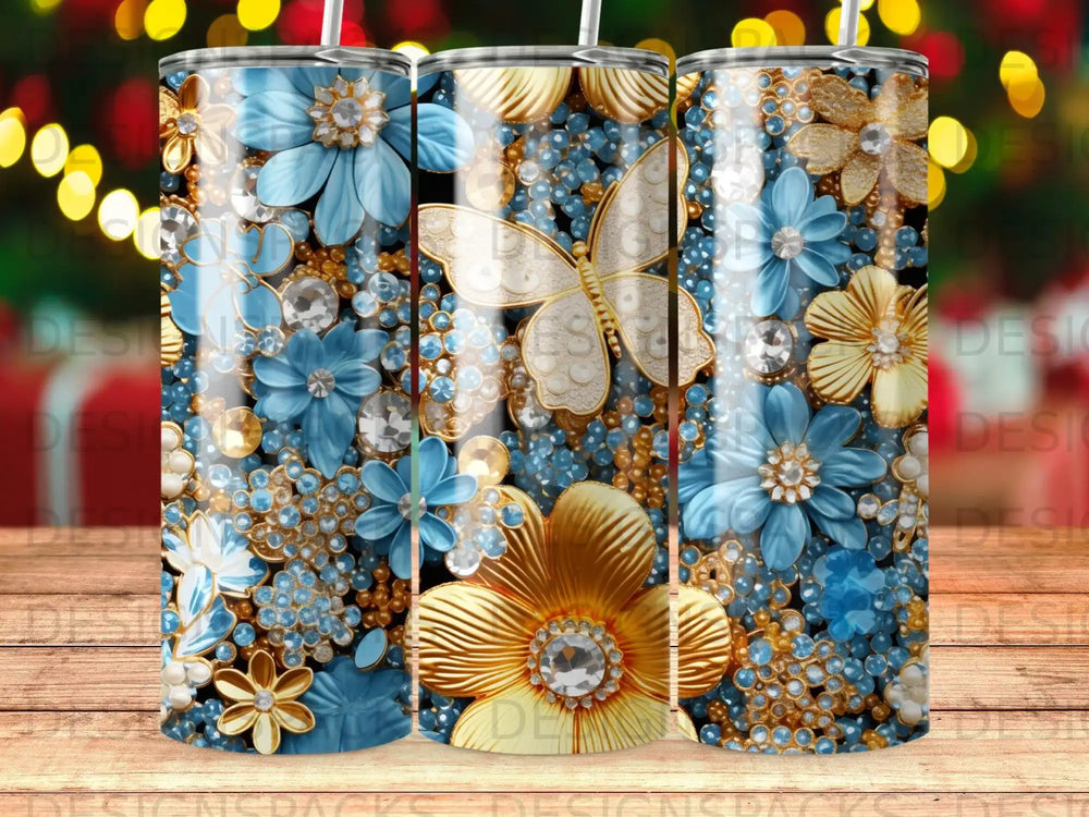 Tumbler with blue and gold floral design and a white butterfly.