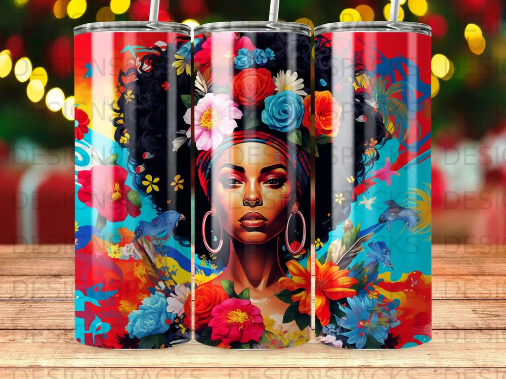 Vibrant tumbler featuring a woman with flowers in her hair and colorful birds.