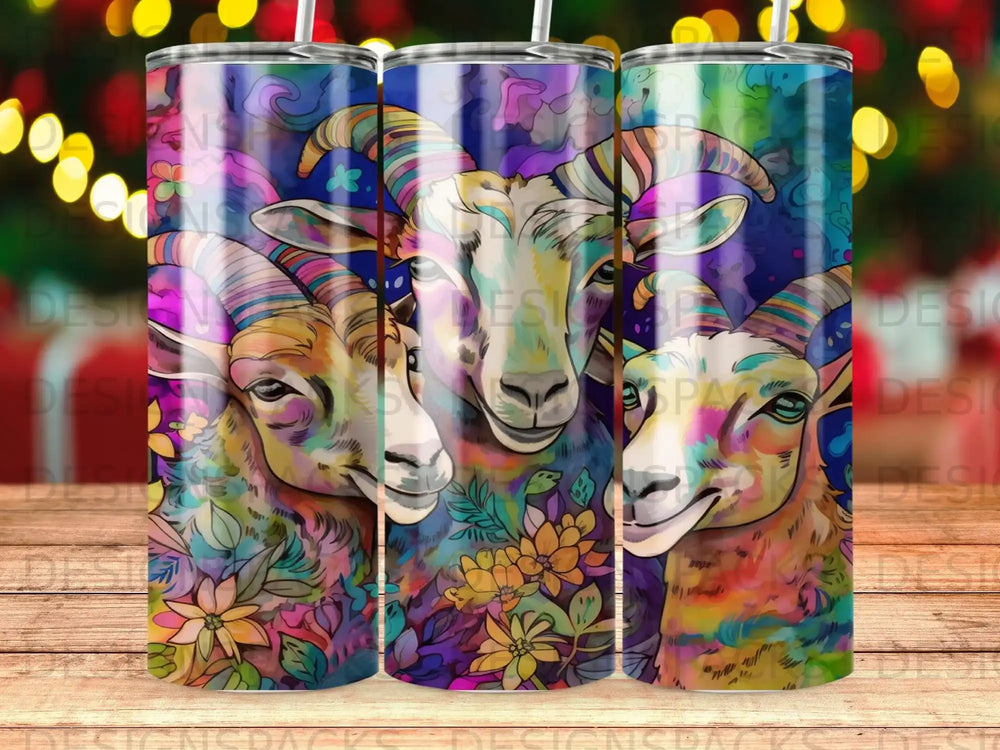 Three goats with colorful floral patterns on a blue background.