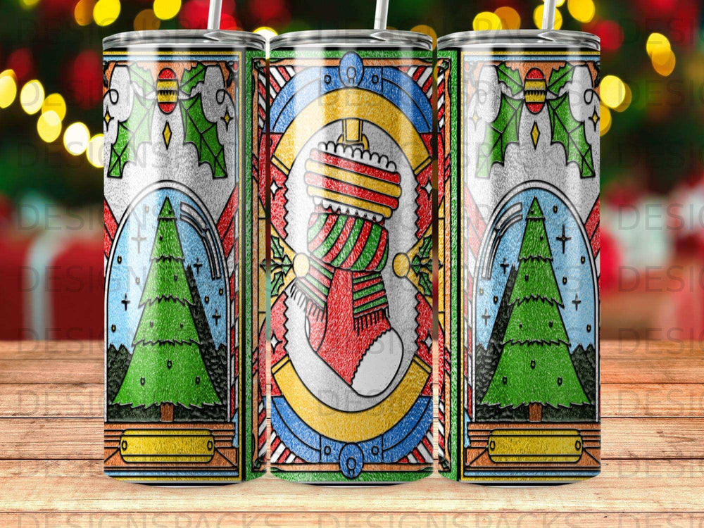 Christmas stocking and decorated tree design on three tumblers.