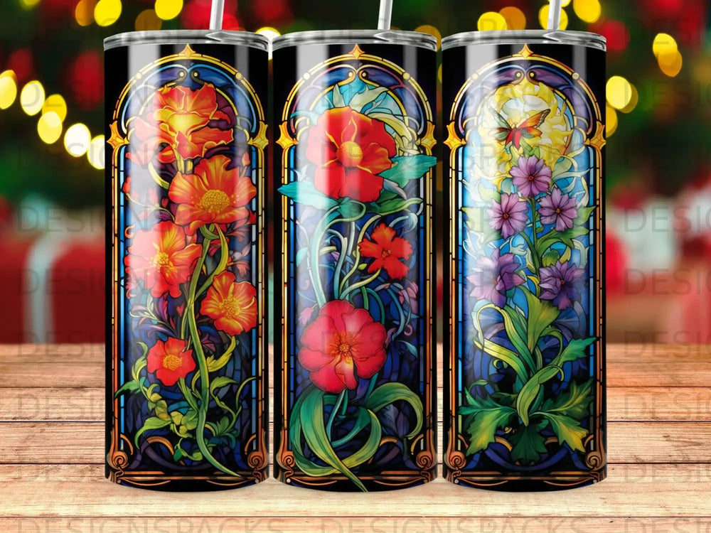 Three tumblers with stained glass floral designs: red, orange, and purple flowers.