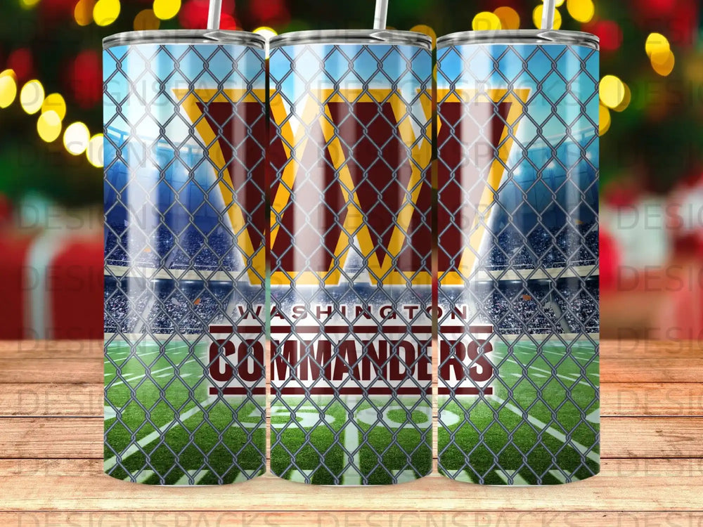 Washington Commanders logo on a football stadium background with chain-link fence.