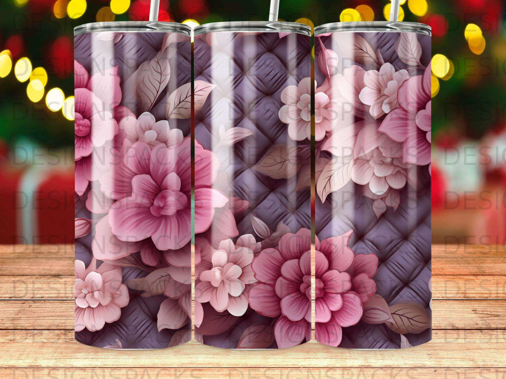 Tumbler with floral pattern of pink and purple flowers on quilted background.