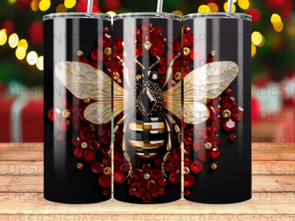 Black tumbler with a detailed bee and red gem accents.
