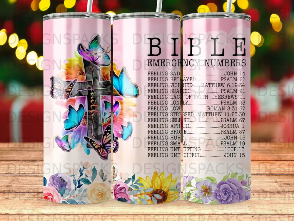 Tumbler with Bible emergency numbers and scripture references on a floral background.