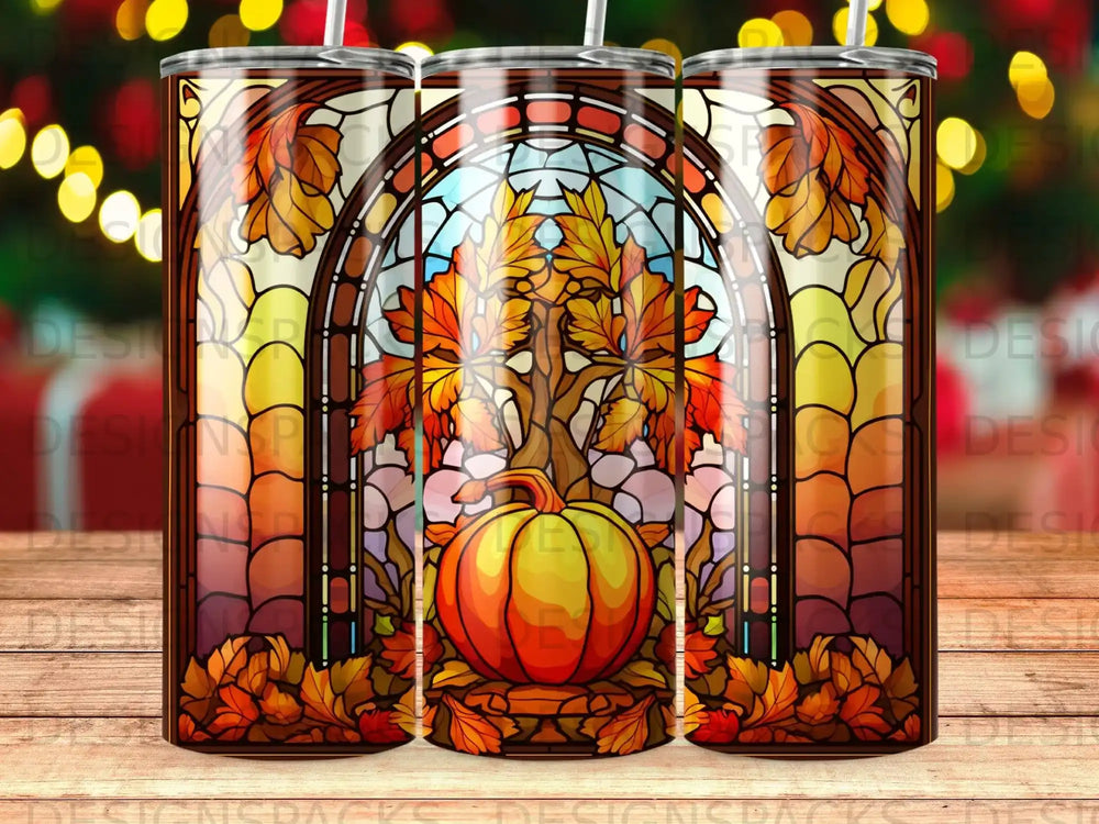 Stained glass design featuring pumpkin and autumn leaves with bokeh lights.