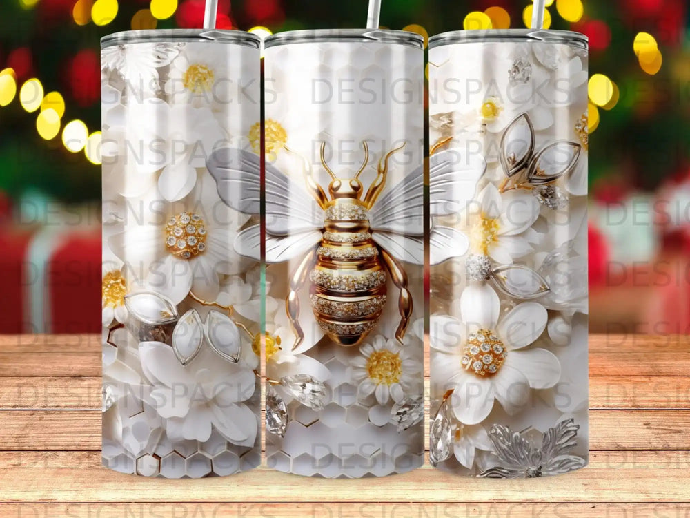 White tumbler with golden bee and floral design, wood grain background.