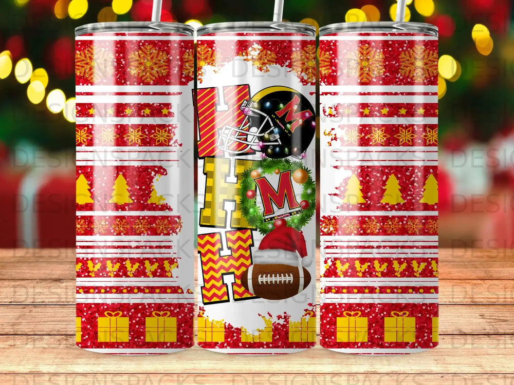 Christmas tumbler with "HO HO HO" text, football helmet, and presents.