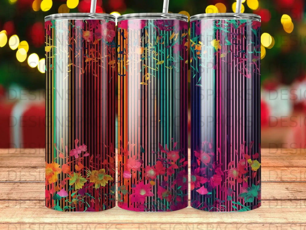 Three tumblers with floral patterns and vertical stripe designs.