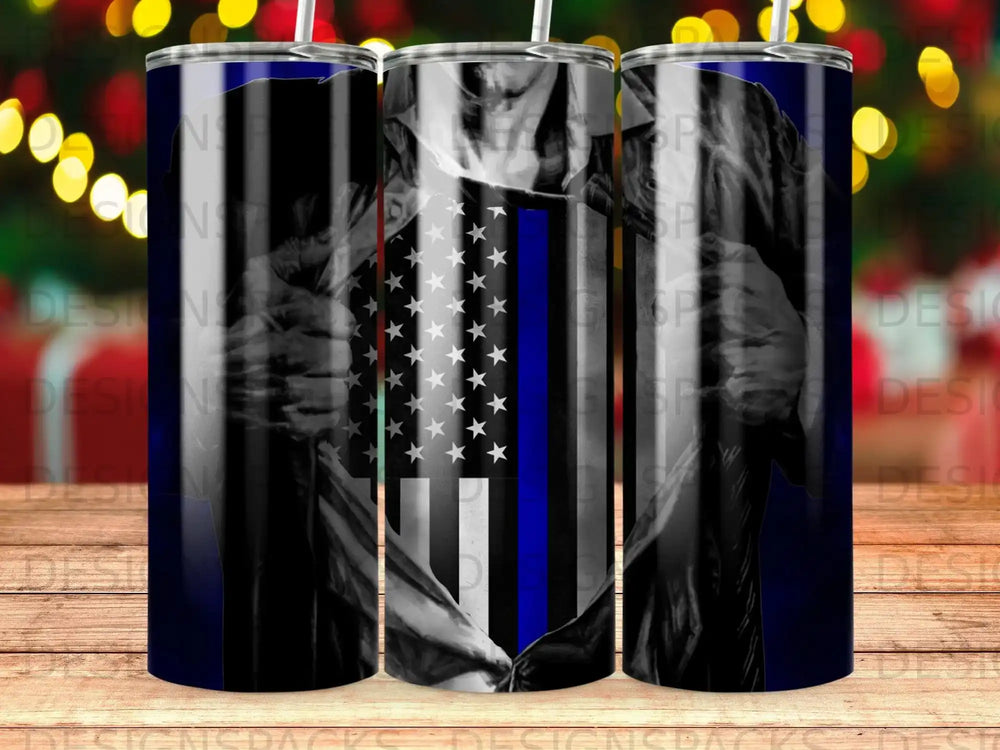 Blue line American flag design on a tumbler, with bokeh lights background.