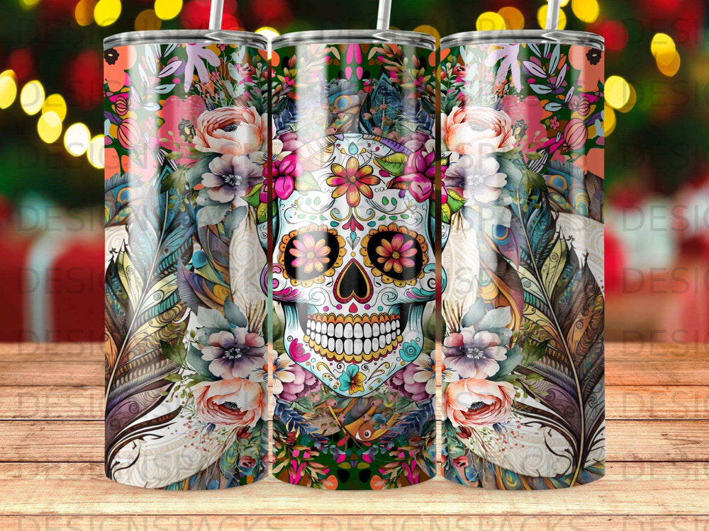 Sugar skull tumbler with colorful floral and feather designs.