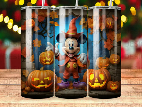 Mickey Mouse in a wizard costume holding a pumpkin with Halloween decorations.