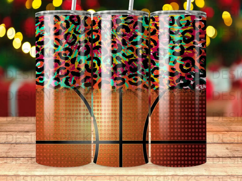 Tumbler with a basketball pattern and leopard print design.