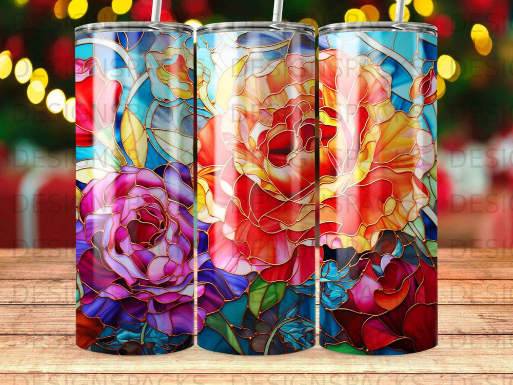 Three stained glass tumblers with colorful rose floral designs.