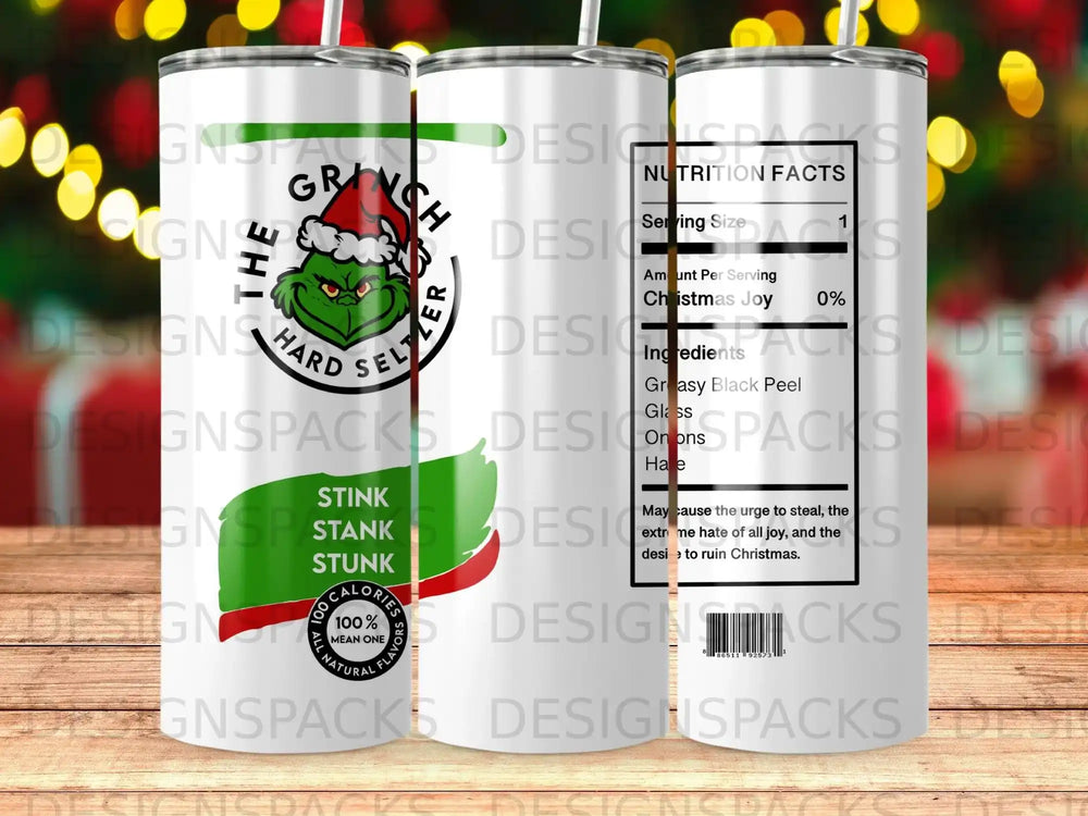 Grinch-themed tumbler with nutrition facts labeling its "Christmas Joy" content.