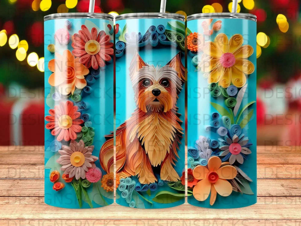 Yorkshire terrier surrounded by colorful paper flowers on a blue background.