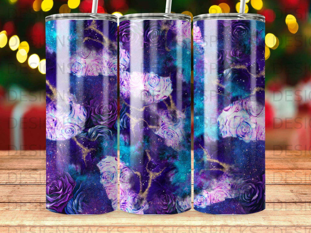 Purple and blue floral tumbler with glitter accents.