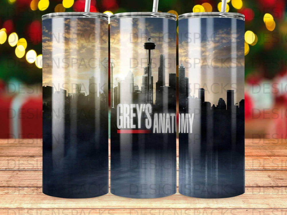 Tumbler with Grey's Anatomy logo and city skyline.