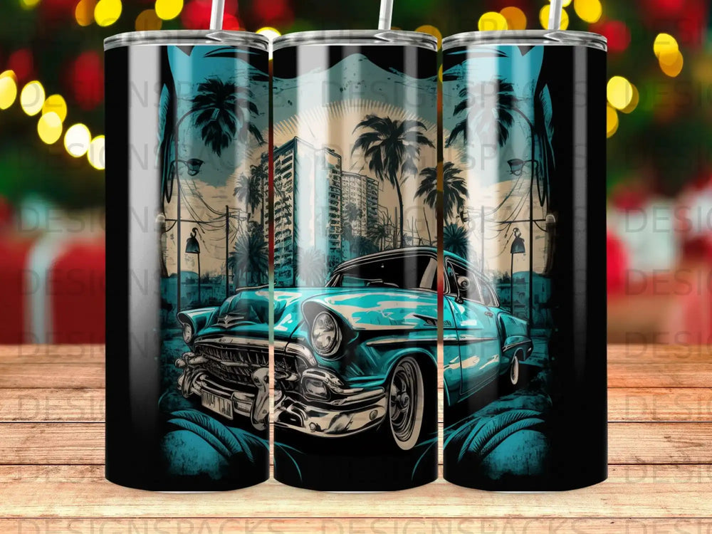 Vintage teal car on a street with palm trees and city buildings.