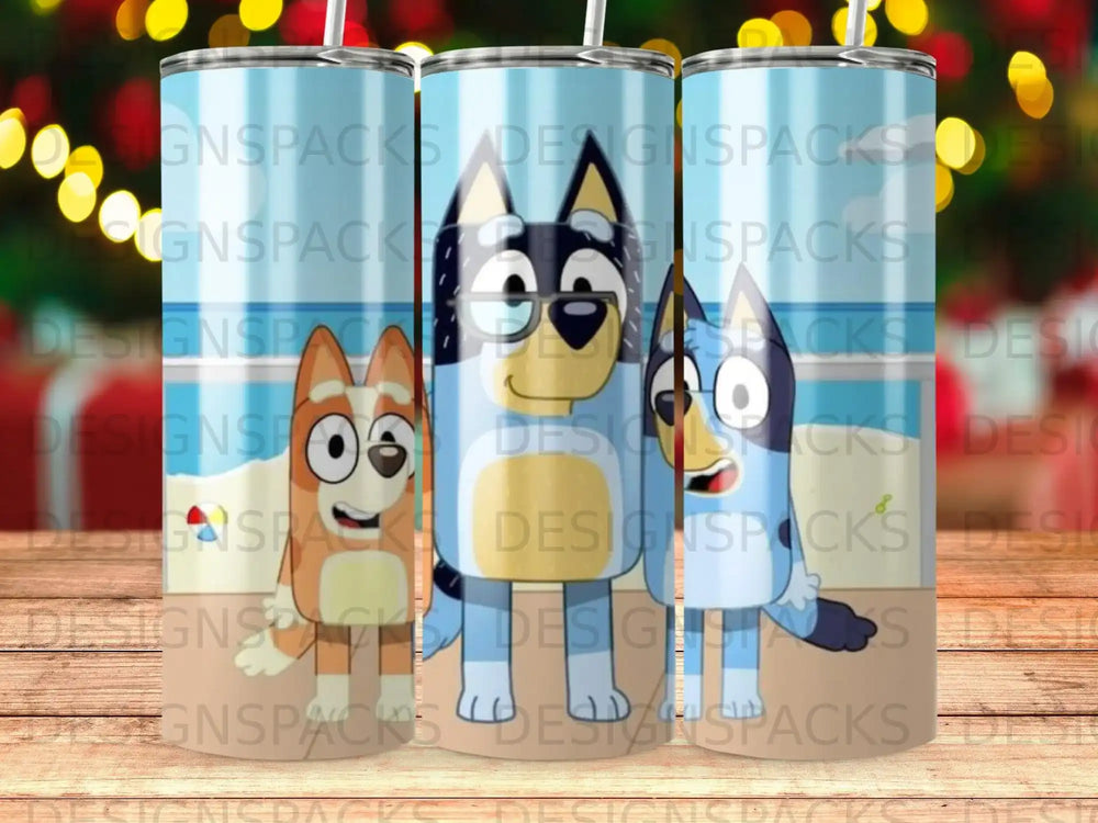 Bluey and Bingo characters on a beach with beach toys.