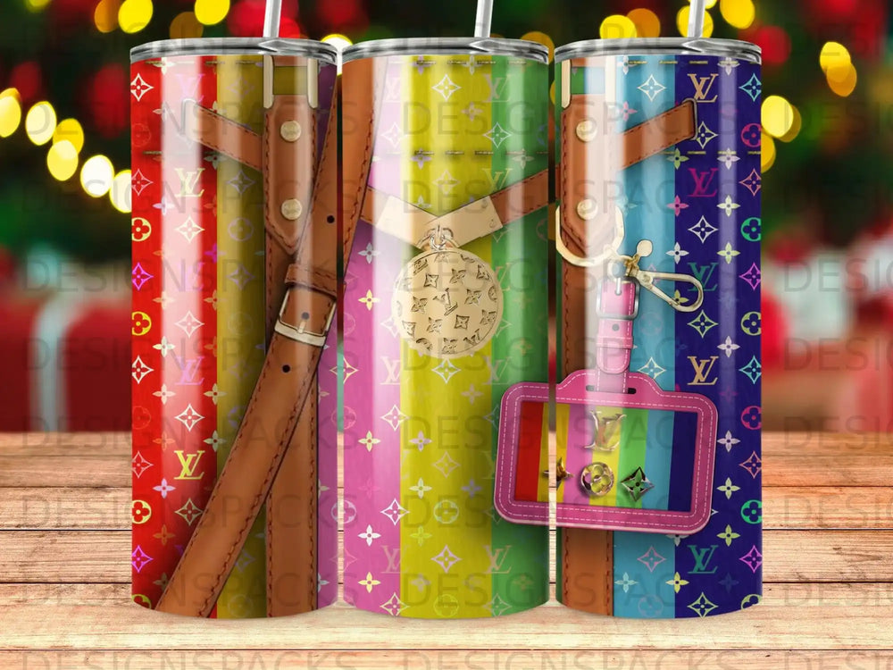 Three tumblers with designer logo pattern and leather strap accents.