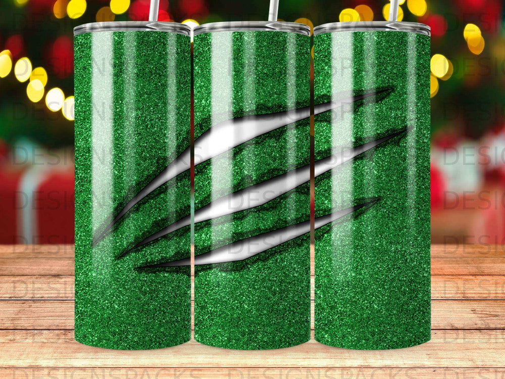 Green glitter tumbler with black claw marks.