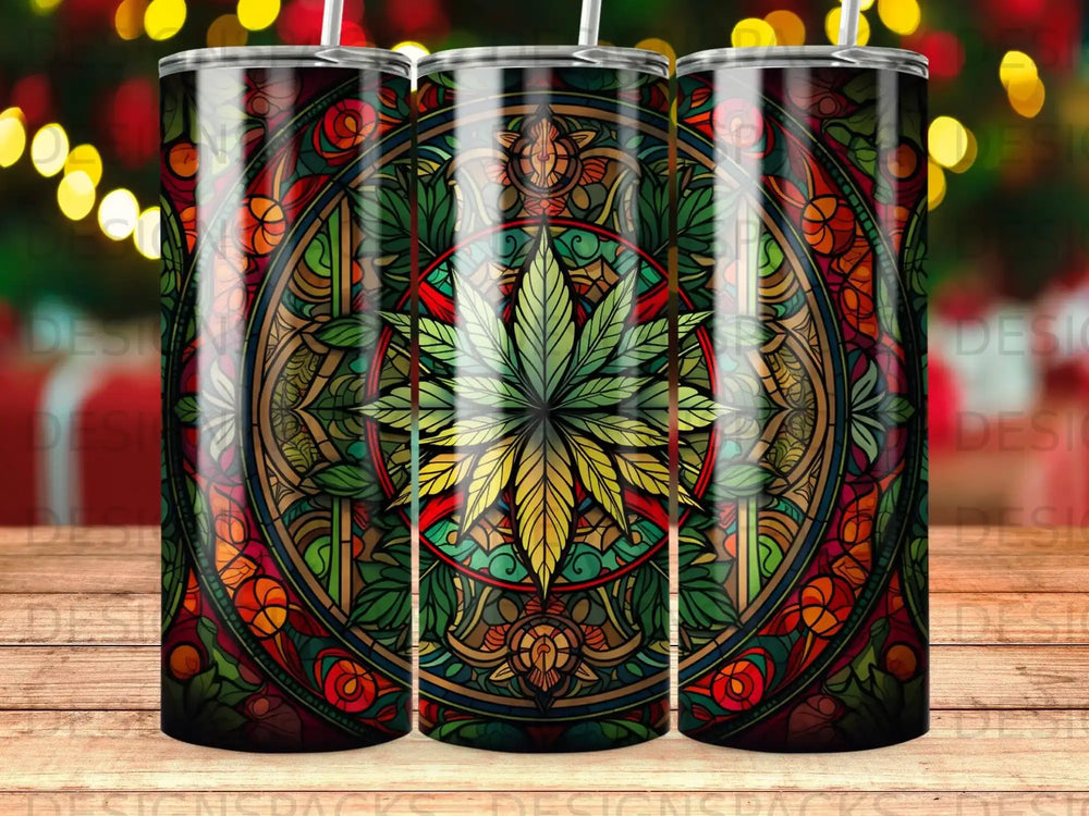 Colorful mandala tumbler with cannabis leaf design.