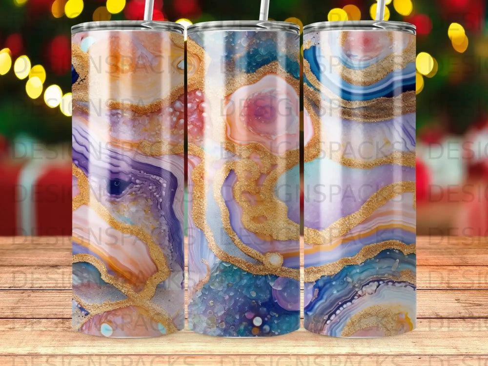 Tumbler with marbled agate and gold glitter design.