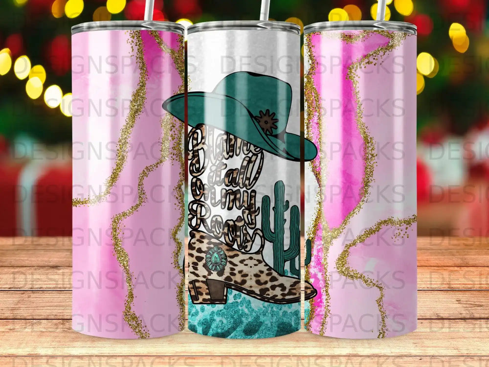 Boots and cactus with glitter on a patterned tumbler.
