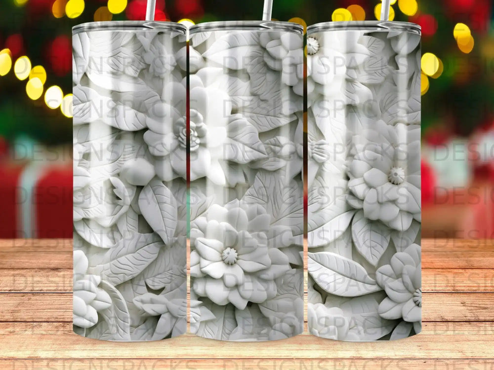 White floral embossed tumbler with wooden background.