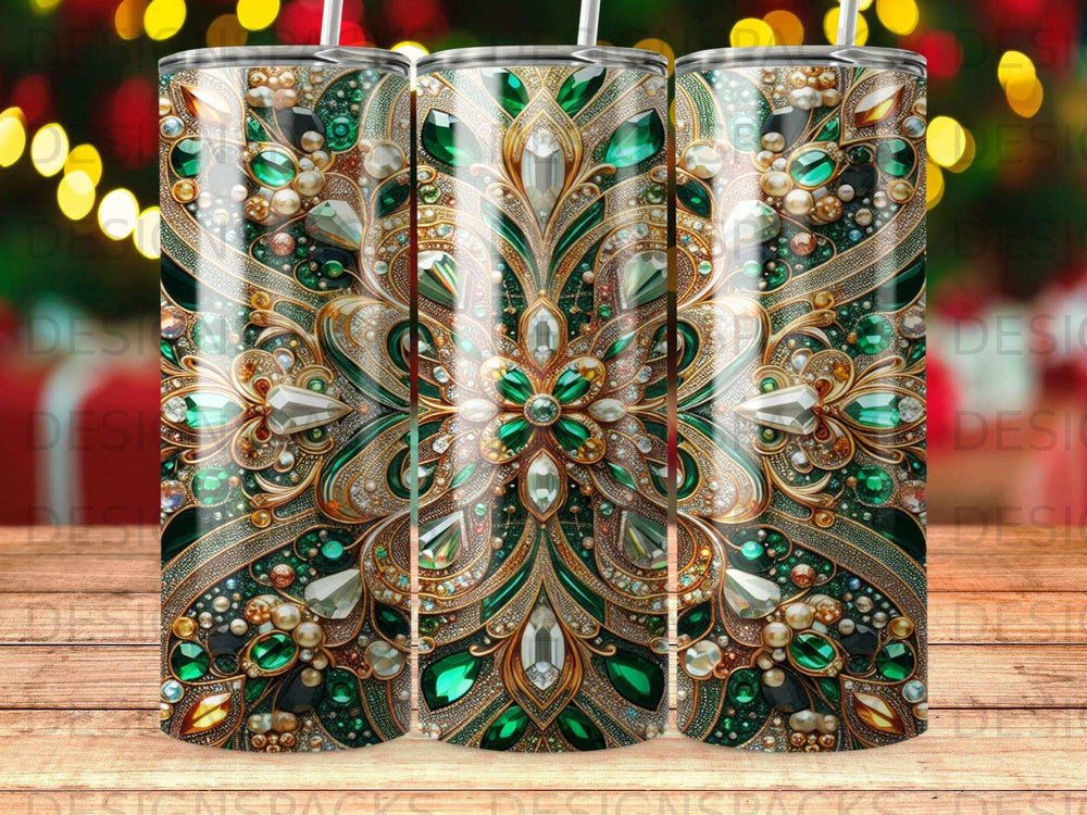 Three tumblers with ornate green gem and gold filigree design.