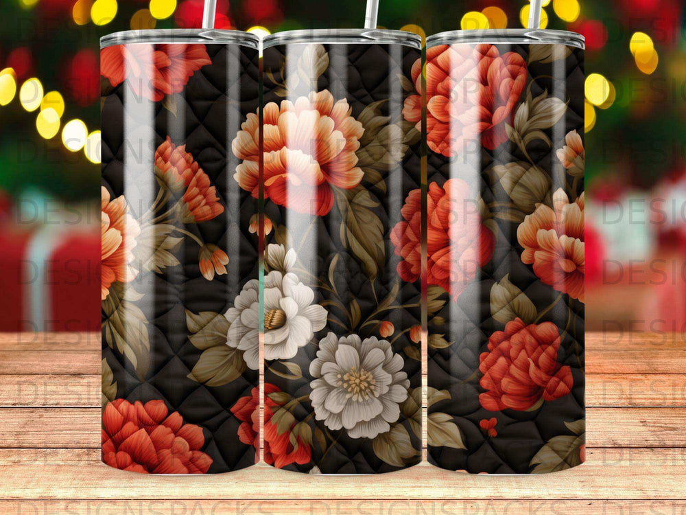 Quilted tumbler with red and white floral pattern.