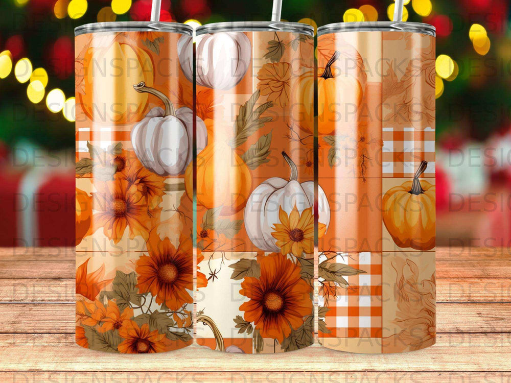 Autumn floral and pumpkin pattern on three tumblers.
