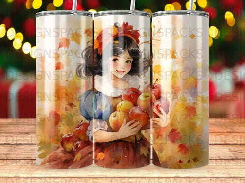 Woman in autumn dress holding apples and pumpkins.