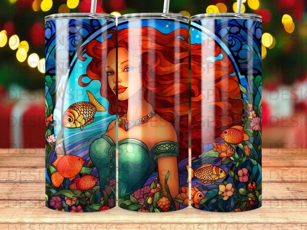 Woman with red hair and fish swimming in decorative, colorful water.