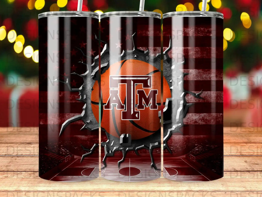 Basketball with Texas A&M logo breaking through American flag background.