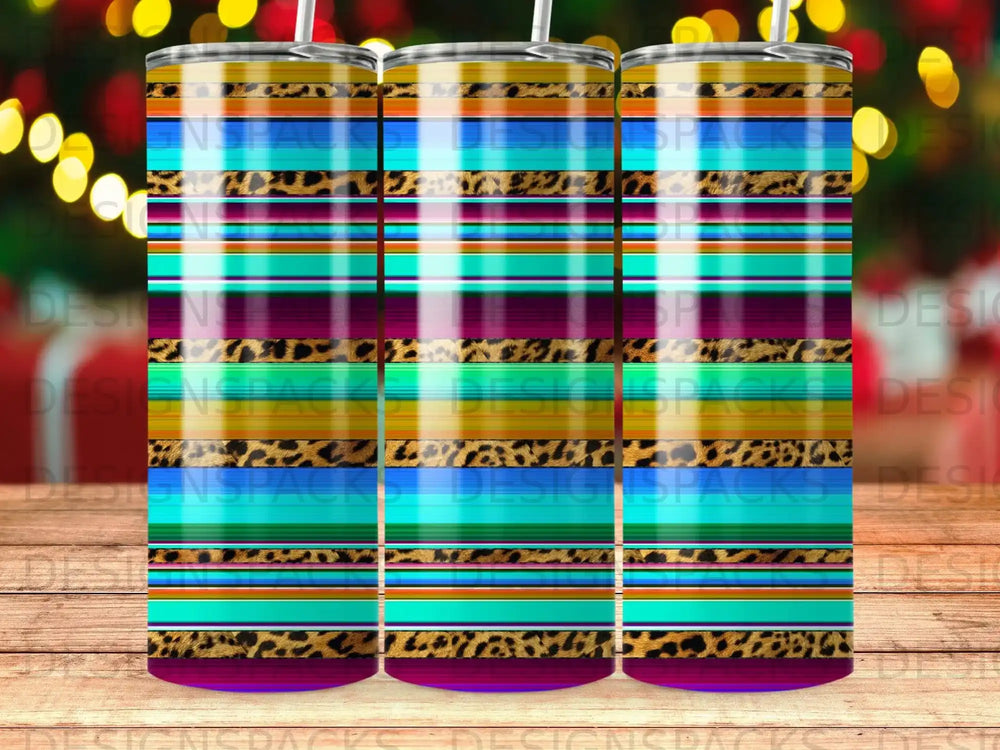 Tumbler with horizontal stripes of leopard print and colorful geometric patterns.