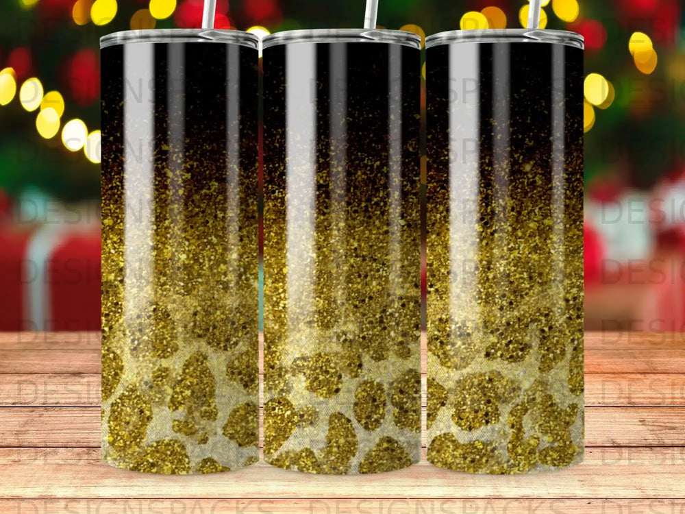 Black and gold glitter tumbler with animal print pattern.
