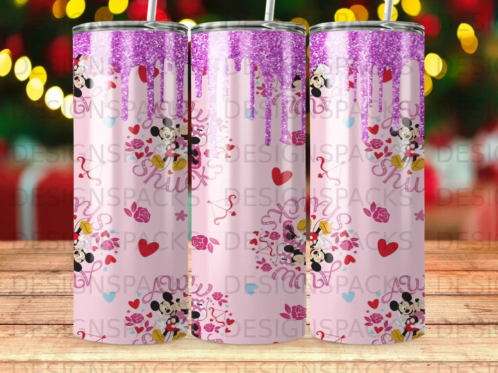Pink tumbler with glitter drips and Mickey Mouse ears with hearts.