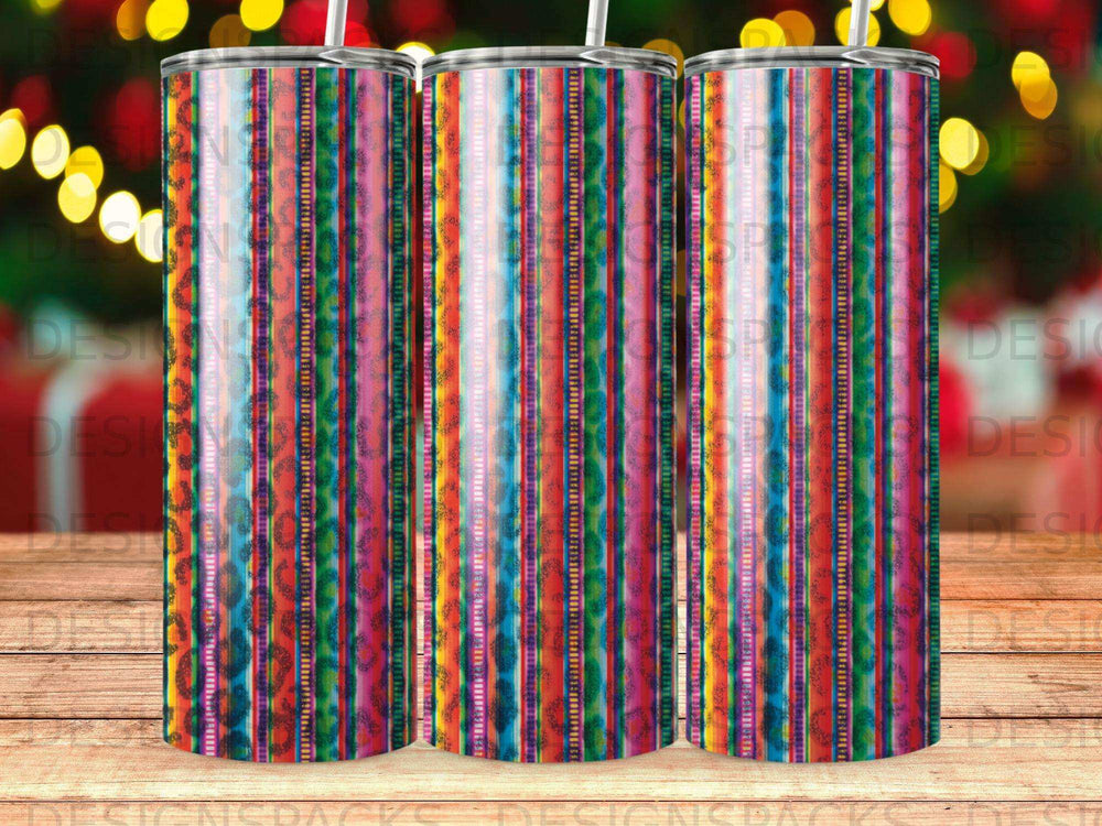 Three tall tumblers with a colorful striped pattern.