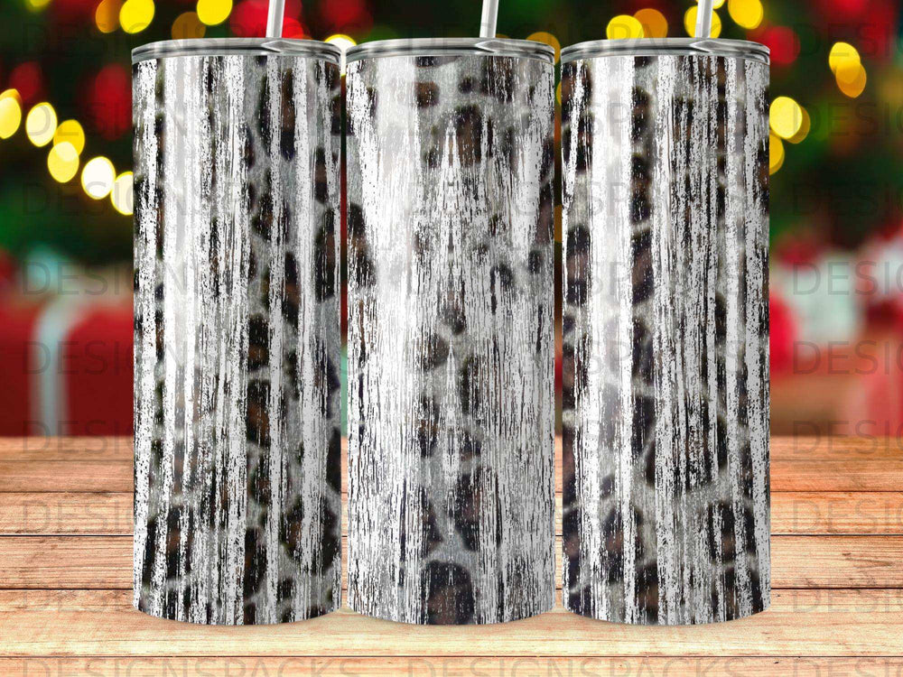 Three metallic tumblers with a distressed leopard print design.